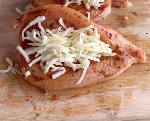 Air Fried Stuffed Hunters Chicken step by step instructions. Step 4, stuff with grated mozzarella cheese